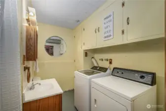 Lower level laundry and 1/2 bath