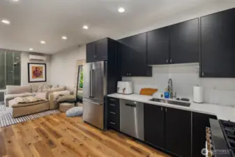 Seamless living room to kitchen for easy entertainment.