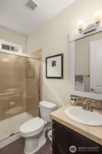 It's more than a powder room; main floor bath comes complete with a shower