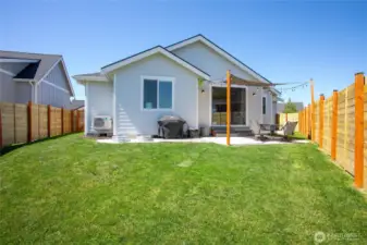 Well-kept yard w/auto-sprinklers all set up