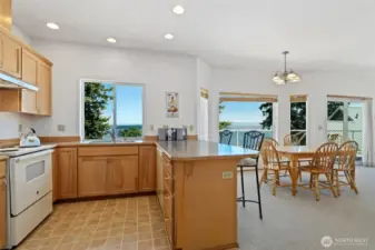 Bright & spacious kitchen & dining area all with incredible views.