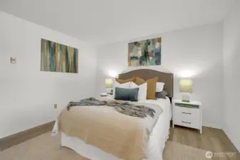 Oversized bonus-style bedroom sits at the end of the hall—large enough to be used as a second primary.