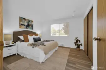 Oversized secondary bedroom that could easily flex as a second primary.