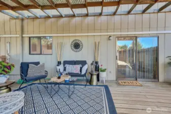 Opens to peaceful green space, perfect for entertaining or quiet moments.