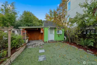 A detached studio and work shed invite creativity — whether as a green thumb’s toolhouse, a personal gym, or an art studio, the possibilities are endless.