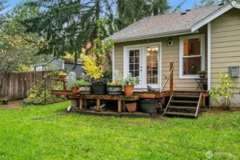 French Doors off the Dining Room to the Private Deck which has steps directly into your new backyard!