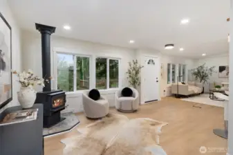 Get cozy with your favorite book by the radiant wood fireplace.