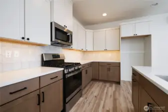 Kitchen - Pics are of a different 1785 plan. Features and colors may differ.