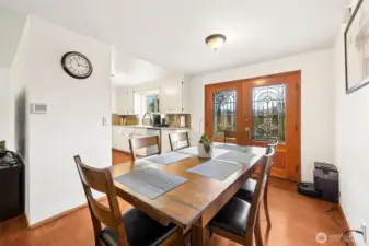Lovely French doors lead from the dining room out to the private patio for easy access to the BBQ.