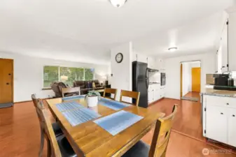 Generous sized dining space between the kitchen and family room. Making this room feel very open and visible.