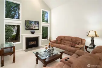 Living Room with gas fireplace, clerestory windows and a second story vault is amazing@