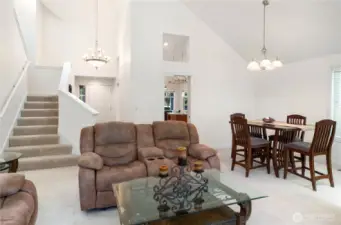 Looking back towards entry and getting a sense of the layout of the great room and how it flows naturally to the dining space, kitchen and upper level