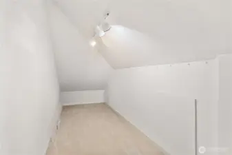 more finished space attached to the second bedroom - amazingly spacious walk-in closet or something else - you decide.