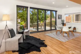 Wall of windows allow the west light in and inside/outside living