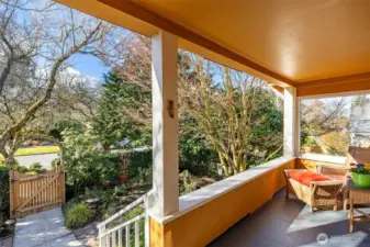 Plenty of room for chairs or a swing and a commanding view of the street.