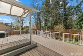 Durable AZEK deck with awning for year-round enjoyment