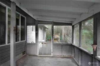 Inside of the screened porch.