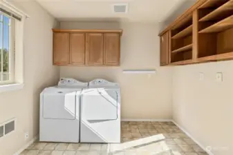 Laundry room located conveniently  located upstairs.