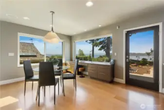 Informal eating space next to the kitchen. Huge views of sound and mountains.