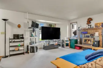 Unit A - Spacious Living Room with cozy fireplace.