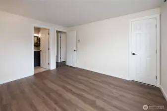 Primary suite offers an updated bathroom & walk-in closet.