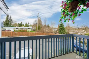 Relax on the deck that includes storage.