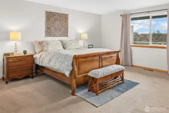 The primary bedroom is larger than most and features a walk in closet and full bath.