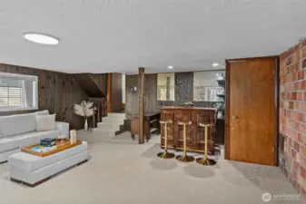 Vintage, collectible gold-patterned mirror tiles behind the bar. Brand new carpet.