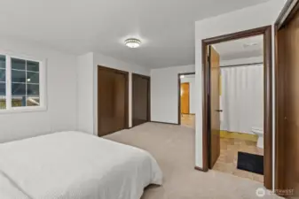 Lots of closet space on both sides of primary bedroom.