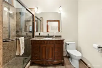 The primary bath features a double spa shower