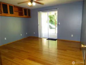 Bonus Room Has Beautiful Bamboo Flooring and Opens To Covered Backyard Trex Deck.
