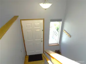 Entry With Oak Hardwood Flooring.