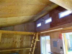 Workshop Has Lots Of Work Space and A Portable ladder.