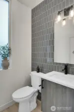 Powder room off of main level hall