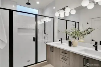 Large bright shower with floating vanity and separate WC room