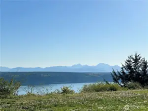 Imagine waking up to the sun rising over the Cascade Mountains & spending your afternoons watching whales from your private deck & patio.