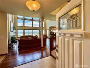 The floor to ceiling windows great you as you walk-in.