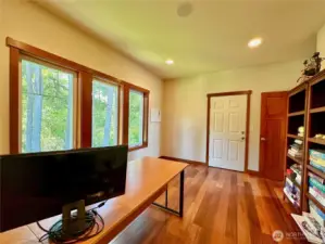 The office has its own entrance separate from the home entrance and has direct access from inside the house.