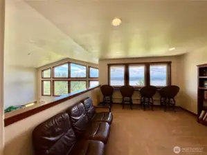 The upstairs loft space allows for more living opportunities!  Movie night anyone?