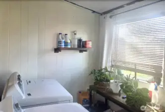 Utility with washer and dryer less than a year old