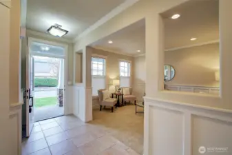 Beautiful entry welcomes you in with a bright and inviting living room just off the foyer.