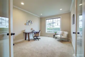 Front office off the entry provides a quiet and functional work-from-home space.