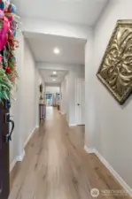 Welcome to your new home! Entry boasts beautiful, durable laminate plank flooring and is widely welcoming. Junior suite with adjacent full bath is immediately to the right.