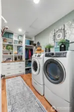 LUXURY in a LAUNDRY room? Really? Seriously, you've got to experience this laundry room to believe it! Lovely shelves and drawers offer stylish storage options, conveniences for hang-drying and more! So cute and functional!