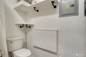 TOILET NEXT TO WASHER DRYER WITH DROP DOWN FOLDING TABLE FOR LAUNDRY