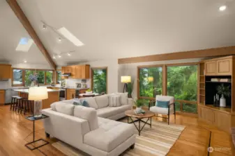 Vaulted ceiling connects the recently updated kitchen to the family room with serene outlooks