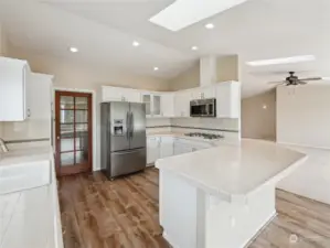 Vaulted Ceilings and Great Lighting.  Luxury Vinyl Flooring in Dining, Kitchen & Pantry