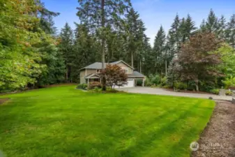 Beautiful 5 acre parcel features a blend of lawn (with sprinkler system) and forest. Gutter guards on the home too.