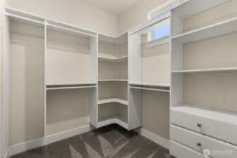 Primary Closet 1 of 2 with built in organizers