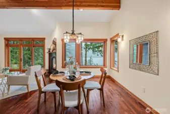 Dining room with custom chandelier and sconces